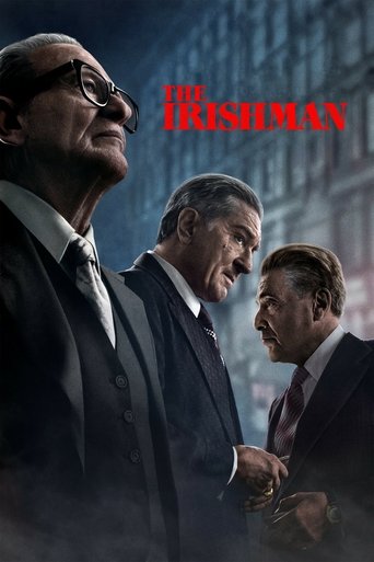 The poster features three men in dark suits against a moody, dimly lit background with hints of red. The central figure looks contemplative, while the others appear serious or contemplative. The overall mood is somber and mysterious, reflecting the film's themes of crime and identity.