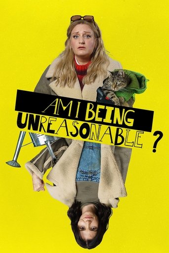 The poster features a woman with sunglasses perched on her head against a vibrant yellow background. She wears a beige coat over a red shirt and blue jeans, with a green object resembling a toy or prop in her hand. Below her, another woman's face is partially visible. The title "AM I BEING UNREAS...