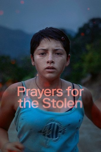 The poster features a young boy in a blue tank top, his expression solemn and contemplative. The text "Prayers for the Stolen" is overlaid in a soft pink font, blending seamlessly with the muted background. The overall mood is somber and reflective, suggesting themes of loss and resilience.