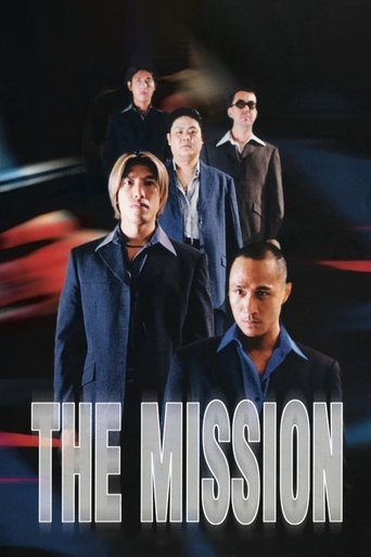 The poster features four men in dark suits against a dark background with red and blue lighting. The title "THE MISSION" is prominently displayed in bold white letters at the bottom. The mood is serious and dramatic, suggesting a high-stakes action movie.