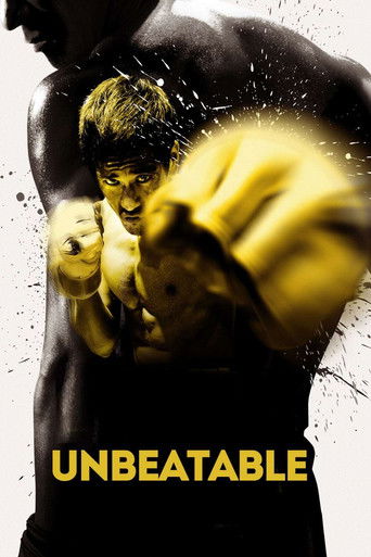 The poster features a muscular man in a dynamic pose, his fists clenched and glowing with intense energy. The bold yellow text "UNBEATABLE" anchors the image, evoking a sense of dominance and power. The gritty, high-contrast design suggests an action-packed thriller, promising thrilling combat an...