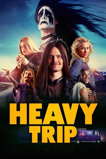 The poster features a group of people in a dramatic, moody atmosphere. The title "HEAVY TRIP" is prominently displayed in bold yellow letters against a dark background. The overall mood is intense and adventurous.