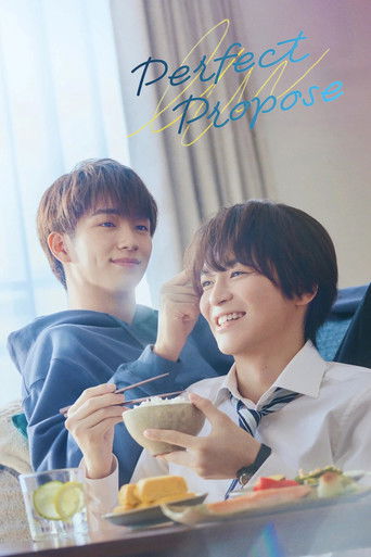 The poster features two smiling young men enjoying a meal together, exuding warmth and happiness. Soft pastel colors like blue and pink create a gentle, inviting atmosphere, capturing the essence of a sweet, romantic moment.