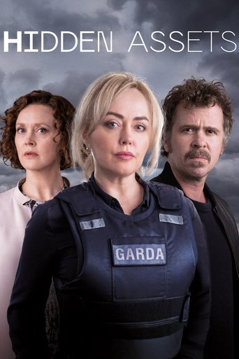 The poster features three characters in a dramatic, stormy sky. The central blonde woman wears a tactical vest labeled "Garda," while the others stand behind her. The muted tones and serious expressions convey a suspenseful, action-oriented mood.
