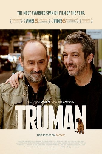 The poster features two men with warm, inviting colors that evoke a sense of camaraderie and nostalgia. The film's title, "Truman," is prominently displayed in bold, white letters, suggesting a serious yet approachable narrative. The overall design conveys a blend of warmth and depth, hinting at ...