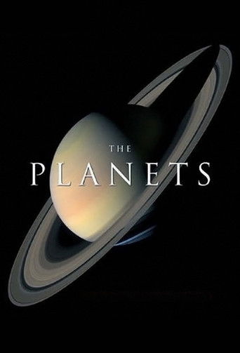 The poster features a majestic Saturn with its iconic rings, set against a deep black background. The title "The Planets" is elegantly displayed in white serif font. The overall mood is mysterious and cosmic, evoking wonder and exploration.