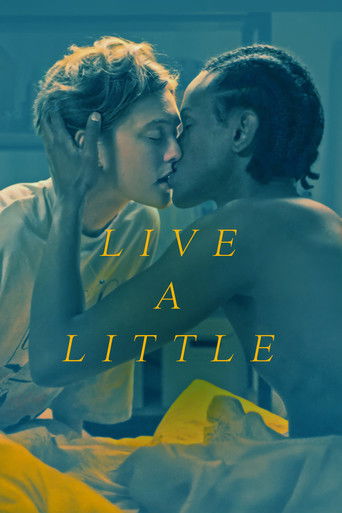 A romantic couple shares an intimate moment on a bed, their faces close as they kiss. The image features a cool blue and yellow color palette, evoking a dreamy, nostalgic atmosphere. The poster captures the essence of a timeless love story.