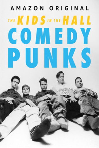 The poster features six young men in casual, colorful clothing, exuding a playful and rebellious vibe. The bold blue text "Comedy Punks" stands out against the black-and-white image, while the "Amazon Original" tagline hints at a fun, accessible comedy experience. The overall mood is lighthearted...
