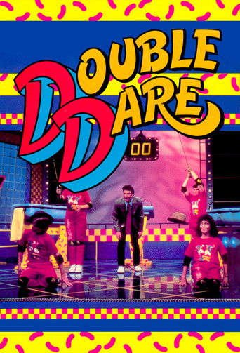 The poster features vibrant yellow and pink background with colorful "DD" logo. Four performers in matching outfits stand on stage, exuding confidence and energy. The mood is energetic and playful, capturing the spirit of the show.