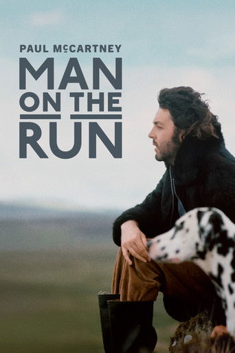 The poster features Paul McCartney and a cow, set against a vast, serene landscape. The muted earth tones and soft lighting evoke a sense of calm and introspection, suggesting themes of freedom and solitude.