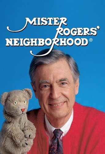 The poster features a warm, inviting scene with a smiling man in a red sweater and tie, exuding a friendly and approachable demeanor. A soft gray teddy bear rests gently on his shoulder, adding a touch of nostalgia and charm. The bright blue background enhances the cheerful and nostalgic mood, ca...