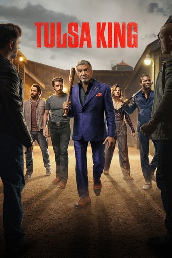 The poster features a man in a blue suit walking confidently toward the viewer, surrounded by a group of men in casual attire. The warm, golden lighting creates a dramatic and tense atmosphere, suggesting a high-stakes drama. The bold red title "TULSA KING" stands out against the muted background...