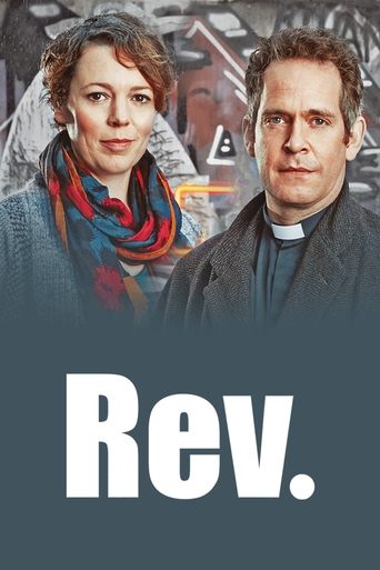 The poster features two characters in a somber, contemplative mood. The woman wears a red scarf against a muted background, while the man in a dark suit stands beside her. The word "Rev." is prominently displayed in bold white letters against a dark gray backdrop, suggesting themes of religious o...