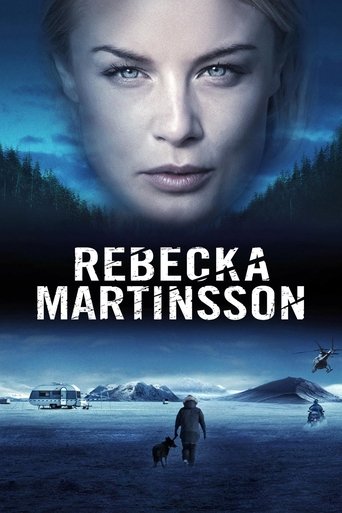 The poster features a striking close-up of a woman's face against a dark, moody sky with distant mountains. Below, a lone figure walks through a snowy landscape, evoking a sense of mystery and solitude. The cool blue tones and serene yet eerie atmosphere create an intriguing and suspenseful mood.