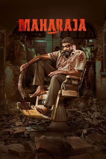 The poster depicts a somber scene with a man in a wheelchair amidst rubble, surrounded by debris and darkness. The title "Maharaja" is prominently displayed in bold, red letters at the top. The overall mood is melancholic and gritty, suggesting themes of struggle and resilience.