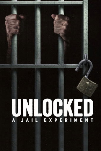 The poster features two hands gripping metal bars, evoking a sense of confinement and mystery. The dark background amplifies the eerie atmosphere, while the metallic color scheme reinforces the prison setting. The title "Unlocked: A Jail Experiment" hints at a suspenseful narrative about freedom ...