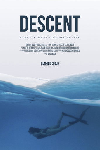 The poster features a lone diver swimming beneath the ocean surface, with deep blue tones and a serene, mysterious mood. The title "DESCENT" is prominently displayed in bold letters, evoking themes of exploration and the unknown.