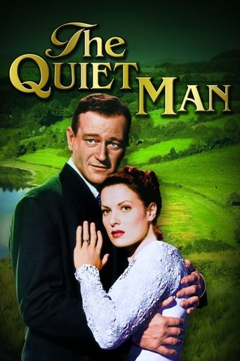 The poster features a man and woman in a romantic embrace against a lush green landscape. The warm tones of the clothing and the verdant background evoke a sense of intimacy and tranquility, while the title "The Quiet Man" in elegant gold lettering hints at the film's themes of inner peace and em...