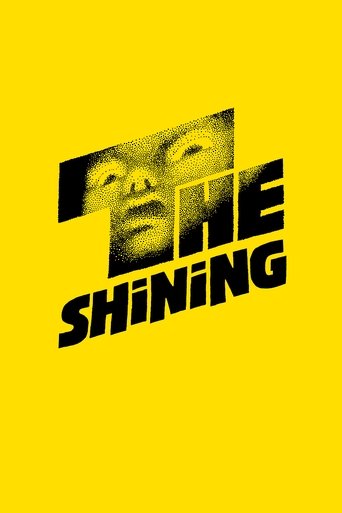The poster features a hauntingly eerie image of a man's face, partially obscured by a jagged black shape, set against a vibrant yellow background. The bold, black text "THE SHINING" adds a chilling, mysterious tone, evoking suspense and horror.