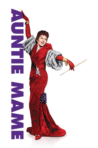 The poster features a glamorous woman in a striking red gown with a feather boa, holding a magic wand. The bold purple text "AUNTIE MAME" stands out against the white background, evoking a magical and whimsical atmosphere.