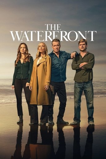 The poster features four characters standing on a beach at sunset, with warm golden hues reflecting in the water beneath them. The mood is relaxed yet adventurous, suggesting a blend of coastal charm and urban intrigue.