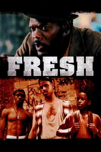 The poster features a gritty, urban scene with a man in a hat and trench coat dominating the top half, while three shirtless men stand in the lower section against a backdrop of graffiti. The warm, earthy tones and intense expressions convey a raw, intense mood, suggesting a gritty, action-packed...
