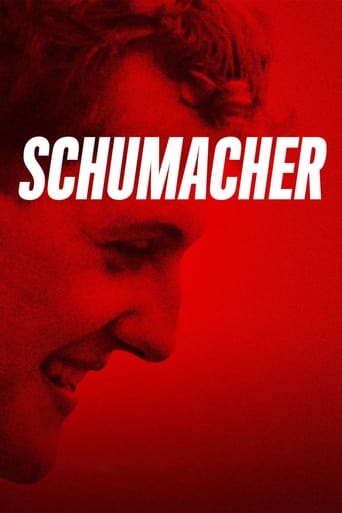 The poster features a man in profile against a vibrant red background, with the title "SCHUMACHER" prominently displayed in bold white letters. The intense red hue evokes a sense of urgency and drama, while the man's contemplative expression adds depth to the film's mysterious and suspenseful atm...