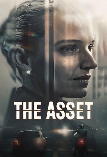 The poster features a split face of a woman, one side showing her human form and the other a sleek, metallic robot head. The colors are muted blues and grays, creating a somber and mysterious atmosphere. The title "THE ASSET" is prominently displayed in bold white letters.
