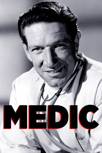 The poster features a black-and-white portrait of a man in a medical uniform, exuding professionalism and trustworthiness. The bold red "MEDIC" text overlays the image, emphasizing the show's name. The overall mood is serious yet inviting, suggesting a blend of clinical expertise and heartfelt st...