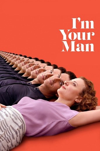 The poster features a row of people lying on their backs against a vibrant orange background, with the title "I'm Your Man" prominently displayed. The mood is playful and lighthearted, suggesting a comedic or romantic comedy genre.