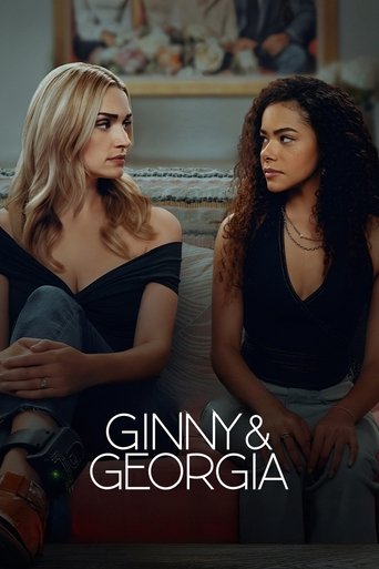 The poster features two young women sitting on a couch, exuding a casual, relaxed atmosphere. The blonde woman on the left wears a black off-the-shoulder top, while the brunette woman on the right sports a black tank top. The warm lighting and soft shadows create a cozy, intimate mood, suggesting...