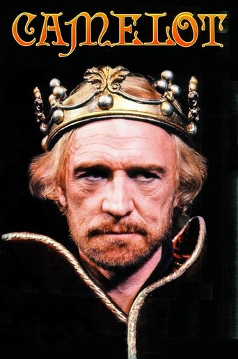 This poster features a stern, weathered man with a mustache and crown, set against a dark background. The golden title "CAMELOT" glows warmly, contrasting with the somber tones of the image. The mood is one of ancient mystery and regal authority.