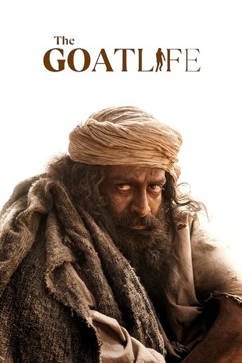 The poster features a rugged man with a long beard and turban, wearing earthy tones of brown and beige. The title "The Goat Life" is elegantly placed at the top in gold lettering. The overall mood is somber and reflective, evoking themes of hardship and resilience.