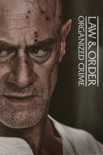 The poster features a close-up of a stern, weathered man with visible scars and a serious expression, set against a dark background. The title "Law & Order: Organized Crime" is elegantly displayed in white serif font on the right side. The overall mood is intense and authoritative, emphasizing th...