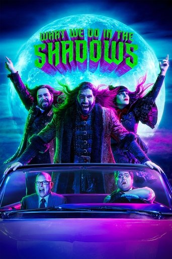 The poster features four characters in a dramatic, neon-lit scene against a glowing moon. The central figure in a flamboyant costume exudes confidence, while the others display expressions of shock or excitement. Vibrant colors like purple, green, and blue create an eerie yet energetic atmosphere...