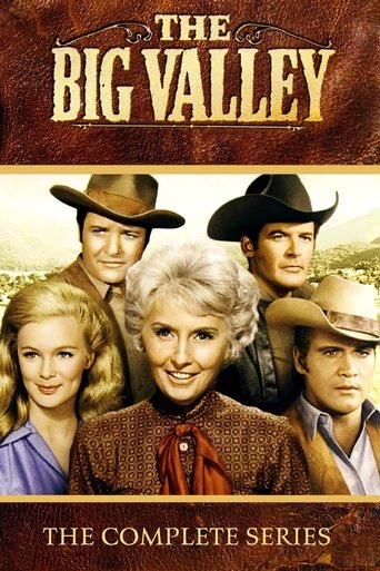 The poster features a group of five men and women in cowboy hats, exuding a rugged, Western charm. Warm earthy tones and golden hues create a nostalgic, inviting atmosphere. The central figure, a woman with blonde hair, stands out against the backdrop of the other characters, suggesting a central...