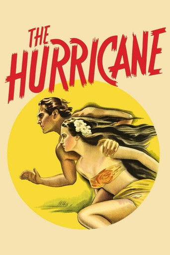 This vintage poster depicts a dramatic scene with a man and woman in motion, surrounded by swirling yellow and red hues. The bold, stylized title "THE HURRICANE" dominates the top, evoking a sense of urgency and natural disaster. The composition captures the chaotic energy of a storm, with figure...