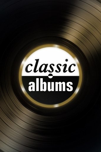 The poster features a classic vinyl record in the center, surrounded by swirling golden light. The words "classic albums" are elegantly written in white against the dark background. The mood is nostalgic and timeless, evoking the essence of timeless music.