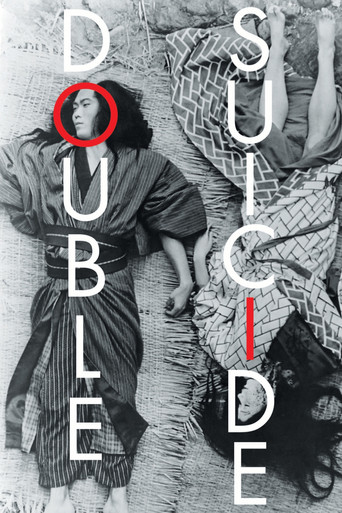The poster features a haunting black-and-white scene of two people lying on a rough, textured surface, their bodies stretched out in a vulnerable pose. The title "DOUBLE SUICIDE" is prominently displayed in bold, white letters, with the word "DOUBLE" stacked vertically on the left and "SUICIDE" o...