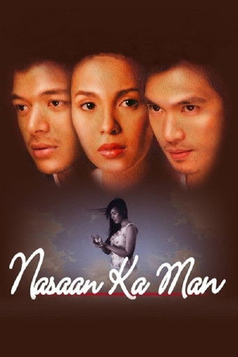 The poster features three young men with intense, serious expressions against a dark background. A woman stands in the center, glowing softly with a mysterious aura. The title "Nasaan Ka Man" is elegantly written in white script at the bottom. The overall mood is mysterious and dramatic, hinting ...