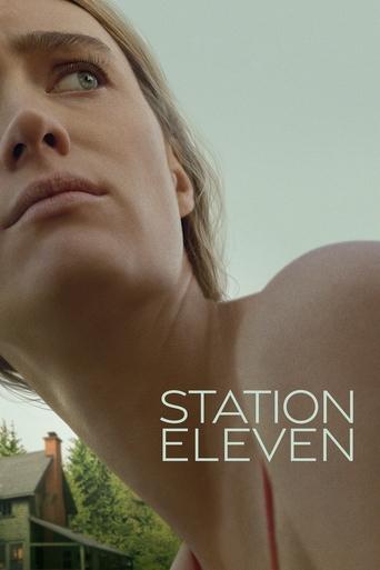 The poster features a woman with a contemplative expression, her gaze directed upward against a soft, pale sky. The muted tones of the image evoke a sense of melancholy and introspection, while the clean typography of "STATION ELEVEN" anchors the composition.