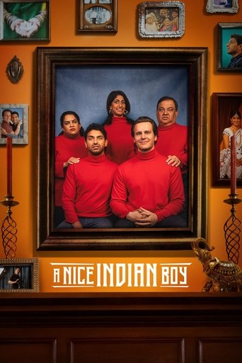 The poster features a group of four men in matching red shirts standing before a large framed portrait of the same group. The warm orange wall and decorative items create a cozy, nostalgic atmosphere. The title at the bottom reads "A Nice Indian Boy" in bold, white letters.
