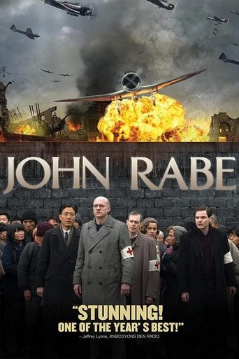 The poster features a dramatic scene with a fiery explosion and flying aircraft above, while the title "JOHN RABE" is prominently displayed in bold letters. Below, a group of men in formal suits stand solemnly against a dark, gritty background, evoking a sense of historical drama and intrigue. Th...