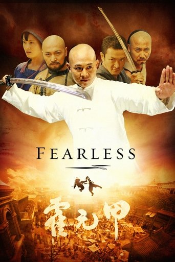 This martial arts poster features a central figure in white with a sword, surrounded by four other characters in warm, earthy tones. The title "Fearless" is prominently displayed, evoking an intense, dramatic atmosphere with a sense of action and courage.