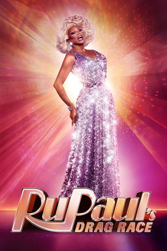 The poster features RuPaul in a dazzling silver gown against a radiant, glowing background. The title "RuPaul's Drag Race" is prominently displayed in bold, metallic letters. The overall mood is glamorous and celebratory, emphasizing the show's star power and entertainment appeal.