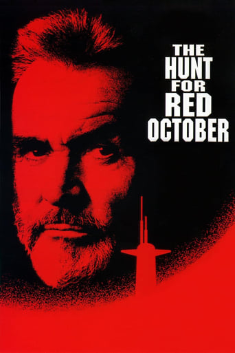 The poster features a close-up of a man's face in stark red against a black background, evoking a sense of mystery and danger. The title "The Hunt for Red October" is prominently displayed in bold white letters, emphasizing the film's intense and suspenseful tone. The overall design creates a chi...