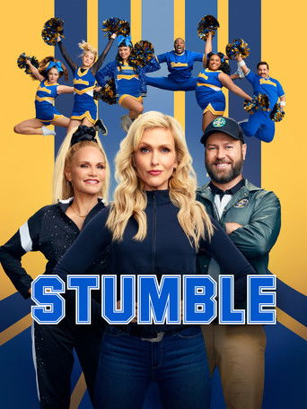 The poster features a blonde woman in the center, flanked by a man and a woman, all dressed in matching blue outfits. Above them, a group of cheerleaders in matching blue uniforms with pom-poms are posed dynamically against a yellow background. The bold blue text "STUMBLE" anchors the image, sugg...