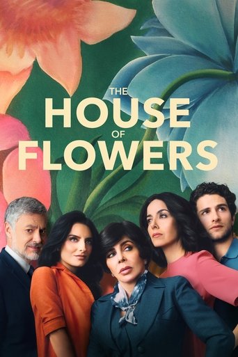 The poster features a group of five characters with expressive faces, set against a vibrant backdrop of large flowers in shades of pink, blue, and green. The warm lighting and colorful floral design evoke a sense of romance and natural beauty, while the characters' confident expressions suggest a...