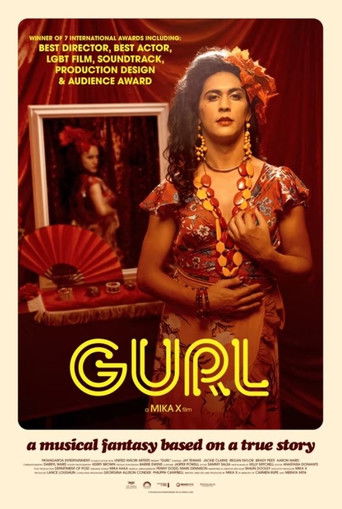 The poster features a glamorous woman in a vibrant red outfit adorned with intricate jewelry and a floral crown, exuding confidence and allure. The warm red background enhances the romantic and dramatic atmosphere, while the bold yellow title "GURL" stands out prominently.