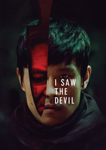 The poster features a split face with one side illuminated in deep red and the other in dark green, creating a striking contrast. The title "I SAW THE DEVIL" is prominently displayed in white text across the center. The overall mood is mysterious and eerie, evoking suspense and horror.